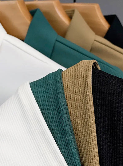 Classic Textured Polo Shirt with Elegant Butterfly Embroidery