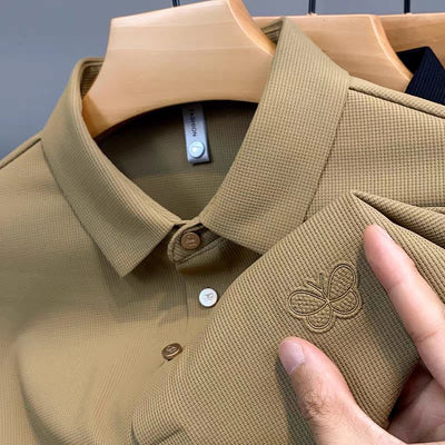 Elegant Textured Polo Shirt with Embroidered Butterfly Logo