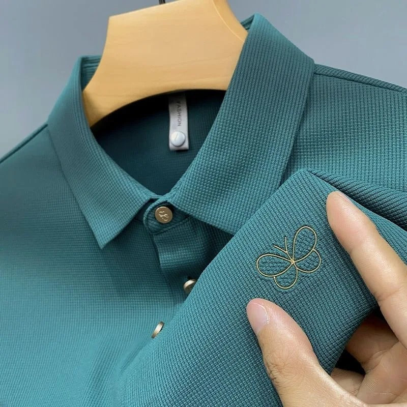 Elegant Textured Polo Shirt with Embroidered Butterfly Logo
