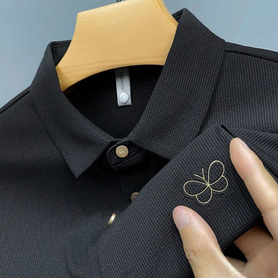 Elegant Textured Polo Shirt with Embroidered Butterfly Logo